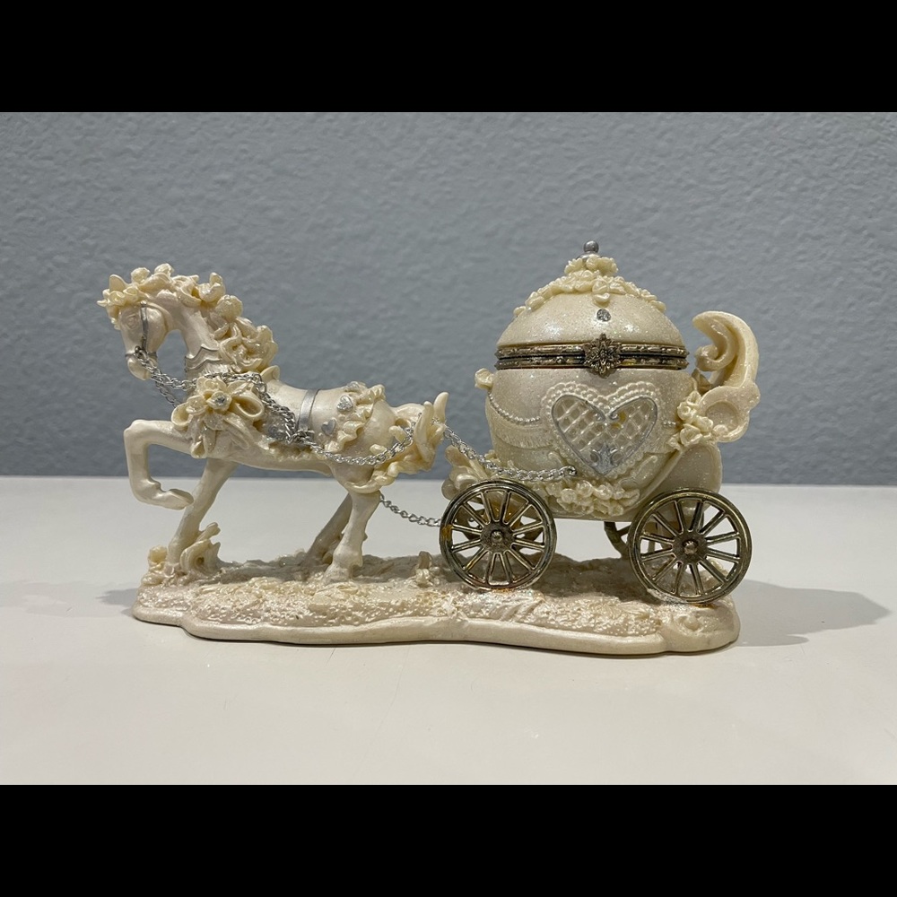 Horse and carriage statue